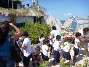 School children visiting the plastic bottle island